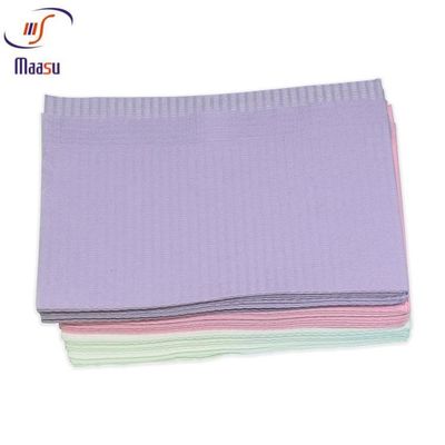 Baberos dentales impermeables médicos disponibles Paper+Poly