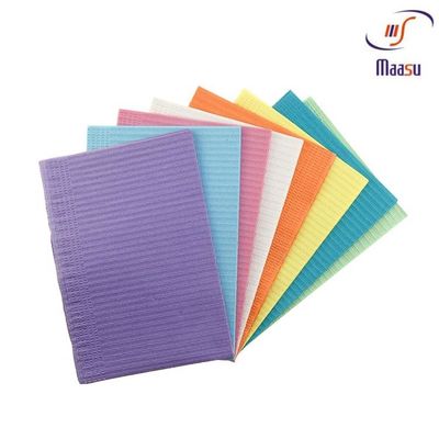 Baberos dentales impermeables médicos disponibles Paper+Poly