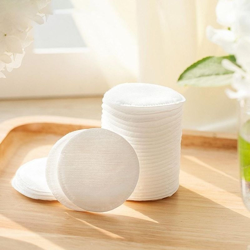 La cara orgánica suave blanca pura del algodón rellena la alta absorción para el uso cosmético